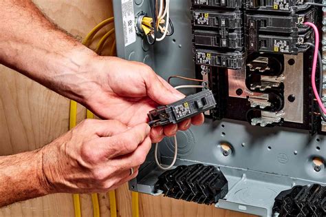 Replace breaker - Showing how to install a GFCI Breaker in a panel.